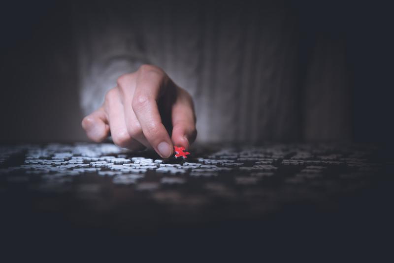 A person working on a puzzle